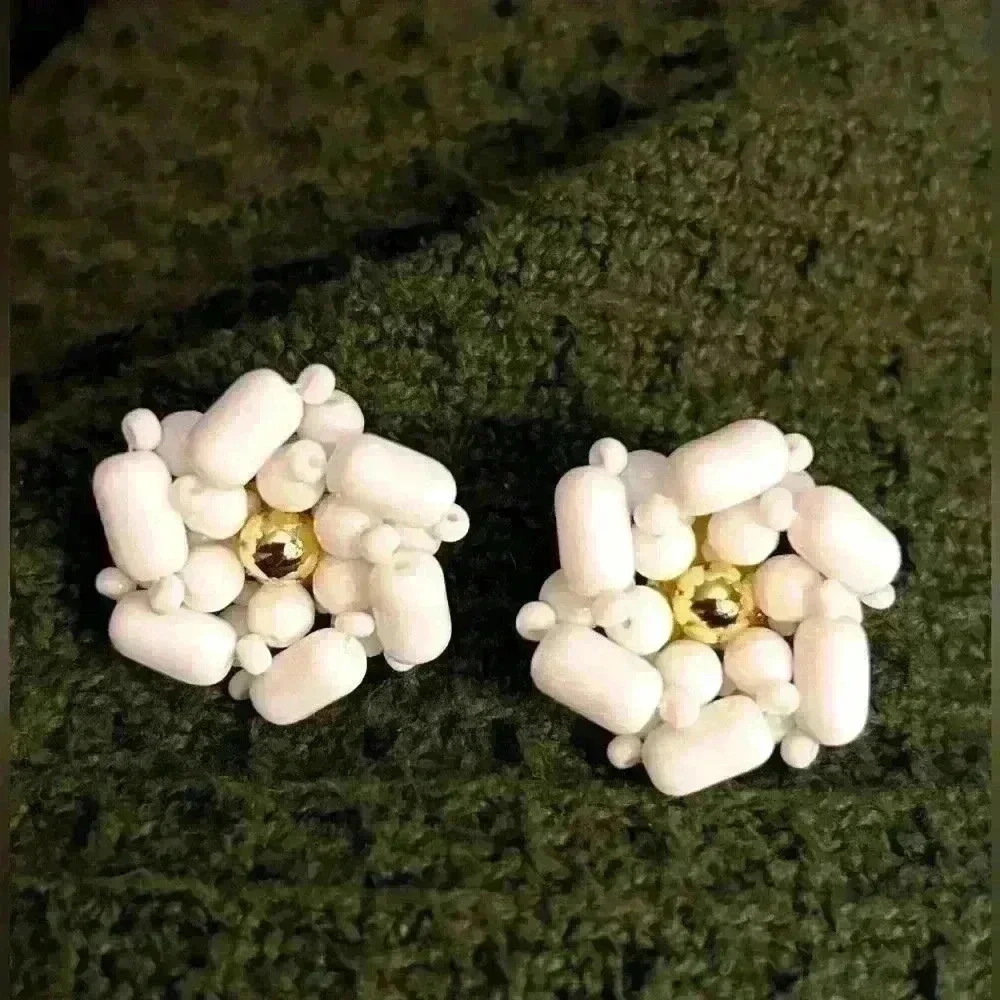Pair of vintage white glass beaded flower clip on earrings